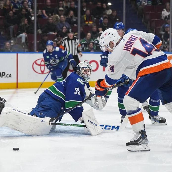 Quinn Hughes scores OT winner as Canucks claw out 4-3 win over Islanders